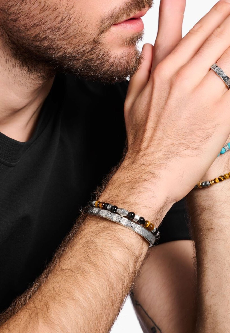 Bracelet jonc design facetté avec pierres noires argentées